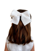 Niña con lazo de lino - complementos de lino